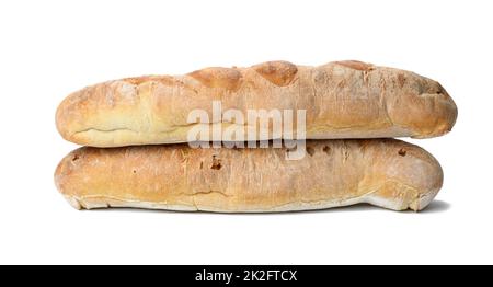 two baked baguettes made from white wheat flour on a white background Stock Photo