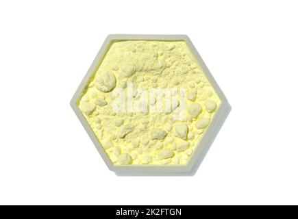 Sulfur Powder in hexagonal  molecular shaped container on white background. Top View Stock Photo