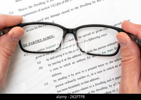 Studying lease agreement Stock Photo