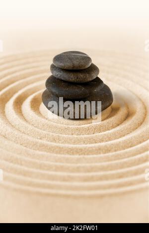 Zen japanese garden and black stones background Stock Photo