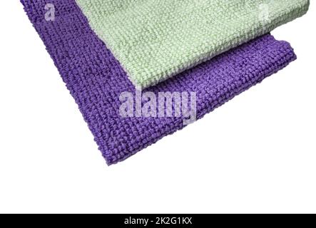 Purple and light green microfiber fabric, highlighted on a white background. New soft microfiber material for cleaning objects and surfaces. Isolated on a white background by clipping Stock Photo