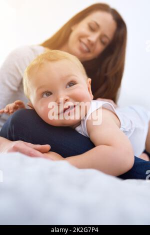 Just chillin with mum. Shot of a mother spending time with her baby boy. Stock Photo