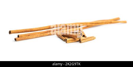 Dry cinnamon sticks isolated on white background. Cinnamon spice. Stock Photo