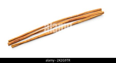 Dry cinnamon sticks isolated on white background. Cinnamon spice. Stock Photo
