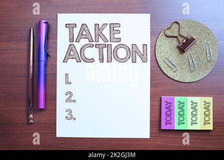 Writing displaying text Take Action. Internet Concept advices someone to do something or reaction right now Stock Photo