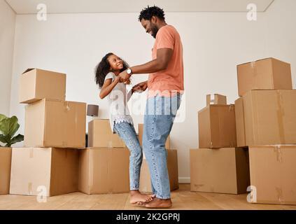 Fathers are the compass that guides us. Shot of a father playing with his daughter at home. Stock Photo