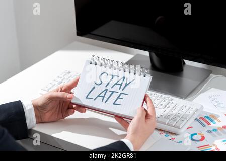 Hand writing sign Stay Late. Conceptual photo A routine in which a person goes to somewhere out of time Stock Photo