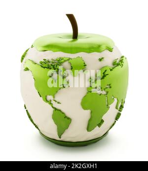 Earth map on half eaten green apple Stock Photo