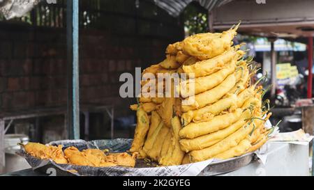 Mirchi pakora or fried chilies on the Street, Bundi, Rajasthan, India. Stock Photo