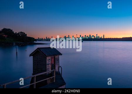 a view of Sydney's city skyline as seen from Watson's Bay at dusk, Sydney, New South Wales. Stock Photo