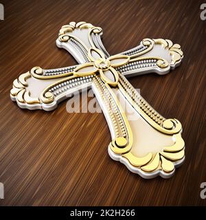 Gold cross on wood background Stock Photo