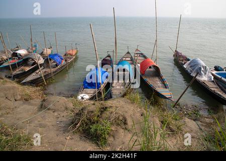 Traditional Some wooden fishing boat on Padma river Stock Photo