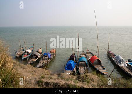 Traditional Some wooden fishing boat on Padma river Stock Photo