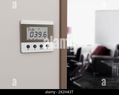 Wall mounted energy meter beside the room entrance Stock Photo