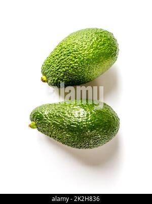 Two avocados isolated on a white background Stock Photo