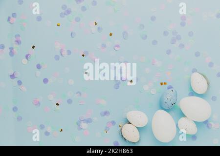 Happy Easter holiday, coming spring concept. Flat lay with branches, white eggs Stock Photo