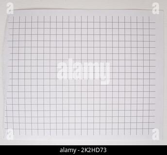 Checkered paper with torn top edge, blank blank sheet, texture and background, copy of space, template Stock Photo