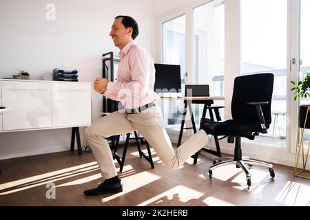 Business Man Doing Bulgarian Split Squat Stock Photo