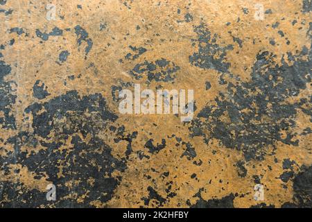 Stained rusty peeled textured wall surface background Stock Photo
