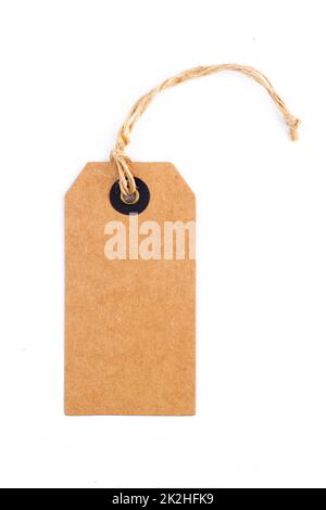 craft paper blank tag mockup with textile thread isolated on white background Stock Photo