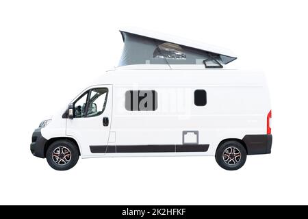 side view of white campervan RV motorhome with tent on top isolated on background Stock Photo