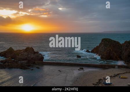 Sunset in the picturesque village Hope Cove in Devon, UK Stock Photo