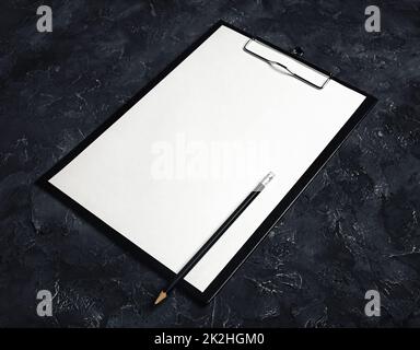 Clipboard and pencil Stock Photo