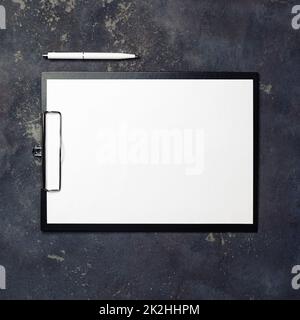 Clipboard, blank paper, pen Stock Photo