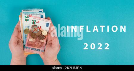 Inflation, financial crash, euro banknotes, economy development and increasing prices, high living costs Stock Photo