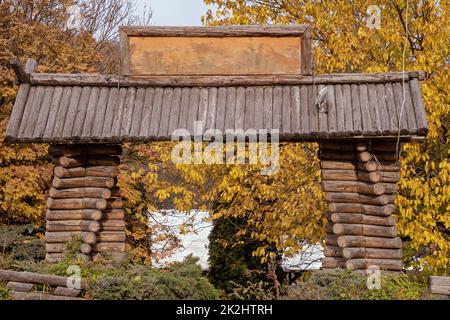 Wooden gate in forest Stock Photo