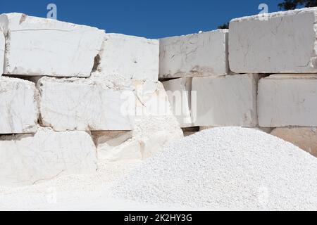 Big white blocks of raw marble from a quarry Stock Photo