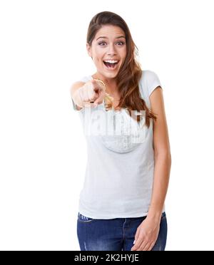 Teasing the camera. A beautiful young woman pointing her finger at the camera in a teasing gesture. Stock Photo