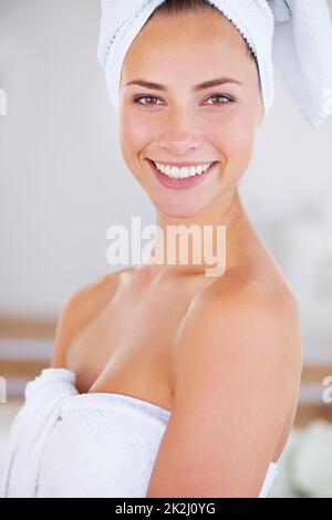 Feeling squeaky clean. Portrait of a woman during her morning beauty routine. Stock Photo