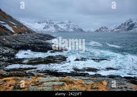 Norwegian Sea waves on rocky coast of Lofoten islands, Norway Stock Photo