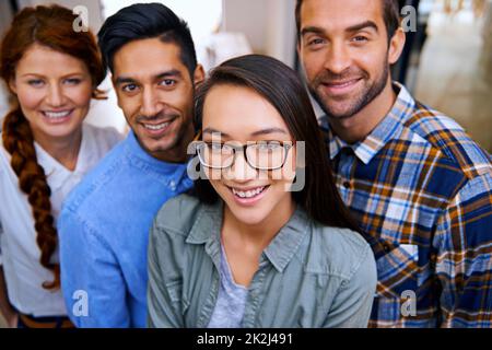 They stay on top of the latest trends. Portrait of a group of young creative professionals. Stock Photo