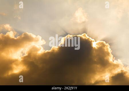 Sunset with fluffy clouds in the twilight sky Stock Photo