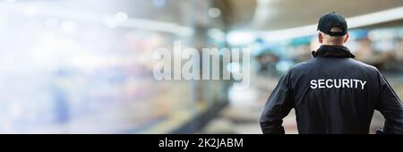 Security Man Looking At Moscow Kremlin And St Basil's Cathedral Stock Photo