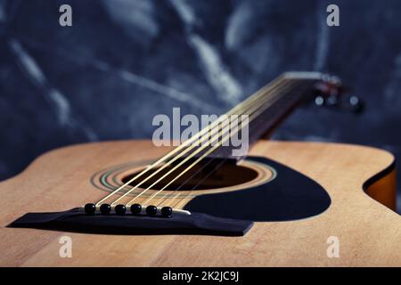 Six stringed acoustic guitar Stock Photo