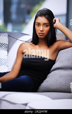 Looking good and feeling comfortable. Cropped portrait of a beautiful young woman at home. Stock Photo