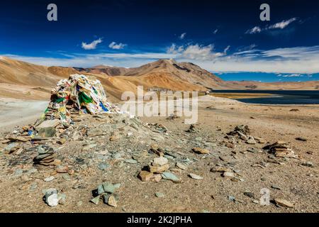 Stone cairn at Himalayan lake Tso Moriri, Ladakh, India Stock Photo