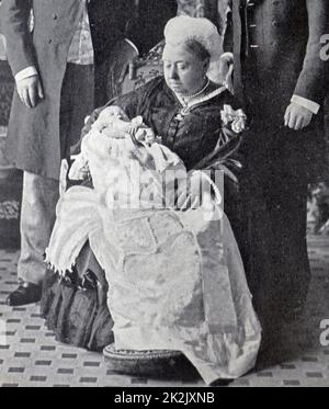 Photograph of Queen Victoria (1819-1901) with King Edward VII, King George V and great-grandson Albert Edward. Dated 20th Century Stock Photo