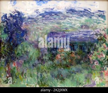 La Maison à Travers les Roses. 'The House Seen Through the Roses' (oil on canvas) by Claude Monet. 1925-1926 Stedelijk Museum of Modern Art, Amsterdam Stock Photo