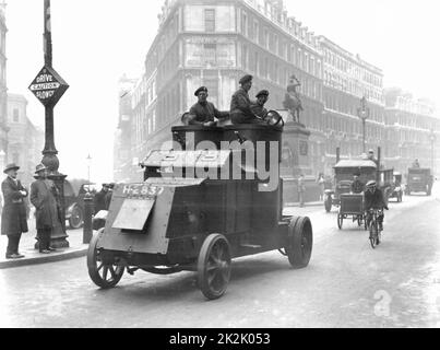 General Strike, Britain, 1926. Food convoy being escorted along Holborn,  London, by troops in armoured cars. Photograph. Stock Photo