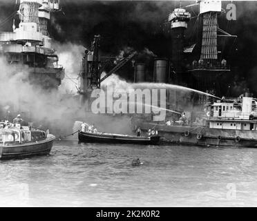 World War II: Japanese attack on United States naval base at Pearl Harbour, Hawaii, 7 December 1941. Battleship USS West Virginia in, flames after hits from Japanese bombs and torpedoes. Stock Photo