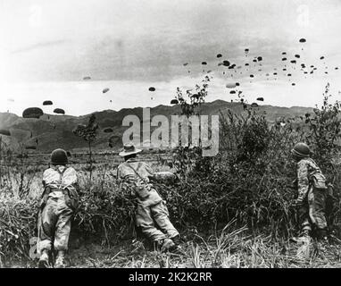 French air troops landing on a Vietnamese field during the Battle of Diên Biên Phu. Spring 1954 Stock Photo