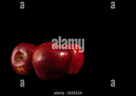 Three red apples Stock Photo