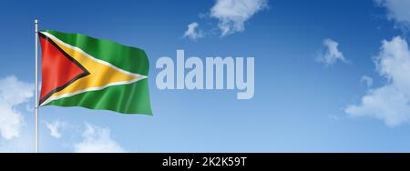 Guyanese flag isolated on a blue sky. Horizontal banner Stock Photo