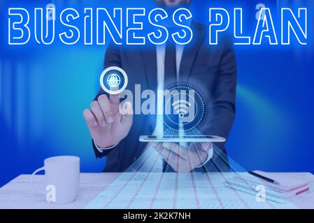 Hand writing sign Business Plan. Business approach Structural Strategy Goals and Objectives Financial Projections Man holding Screen Of Mobile Phone Showing The Futuristic Technology. Stock Photo