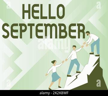 Conceptual caption Hello September. Word for Eagerly wanting a warm welcome to the month of September Colleagues Climbing Upwards Mountain Reaching Success Presenting Teamwork. Stock Photo