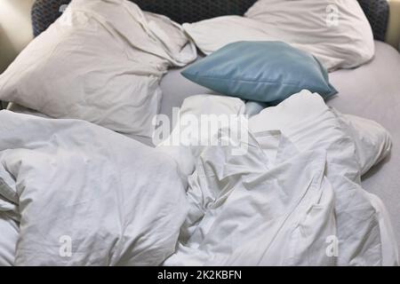 Hotel bed closeup Stock Photo
